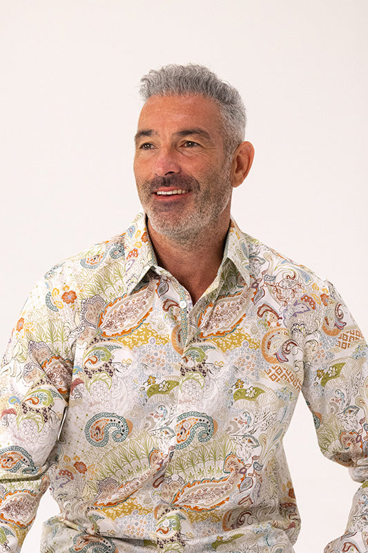 Man wearing a paisley patterned collared shirt